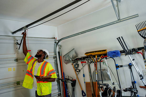 Professional Garage Door Panel Replacement technician working in Fall Creek, WI